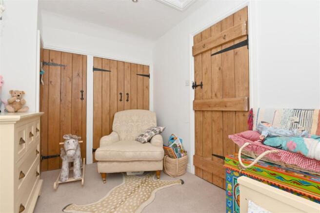 Bedroom 2 to wardrobes.jpg