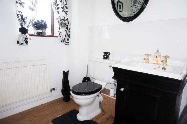 CLOAKROOM AND TOILET