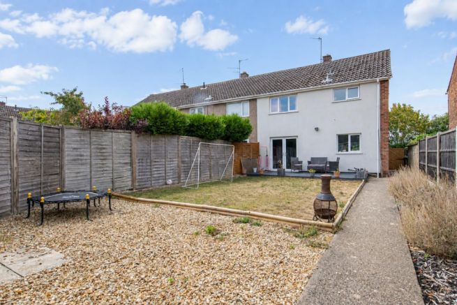Sunlit British rear garden.png