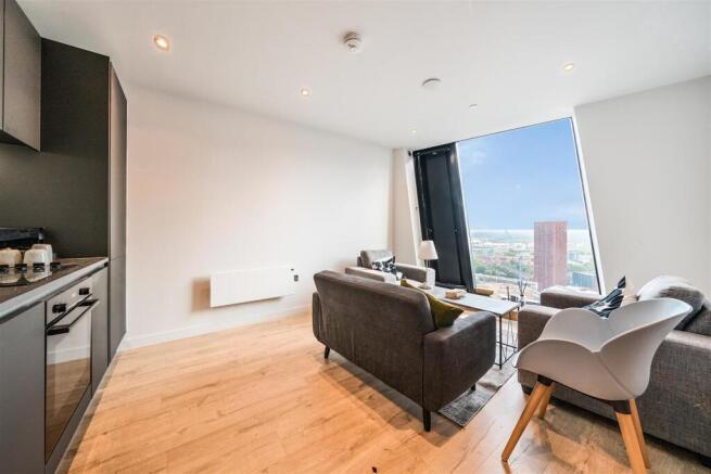 Bright modern lounge with stunning city views...
