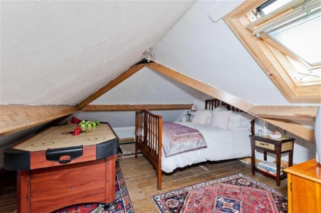 FOURTH ATTIC BEDROOM