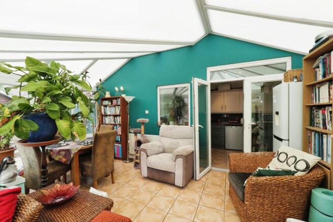 Very Generous conservatory offering further potential