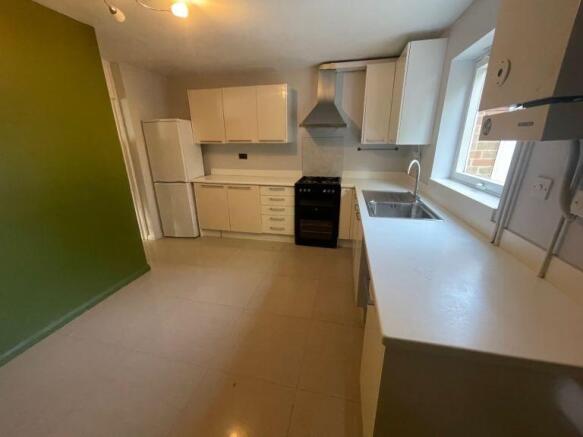 Spacious modern kitchen with ample counter spac...