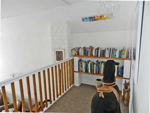 STAIRS FROM THE LIVING ROOM UP TO THE MEZZANINE AR