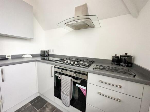 ALTERNATE VIEW OF KITCHEN