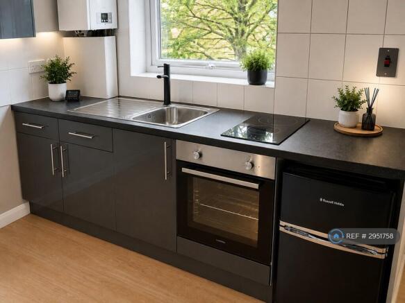 Kitchen Area With Oven Fridge Etc