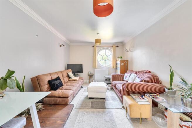 Sitting room with round window.jpg