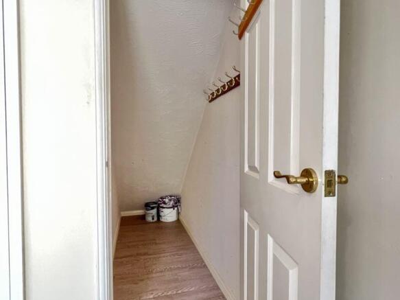UNDERSTAIRS CUPBOARD