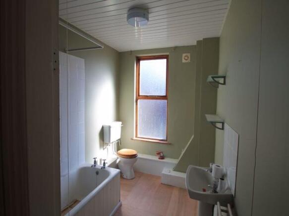 Bright and clean bathroom with natural light st...