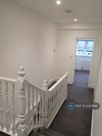 First Floor Hallway Into Bedroom