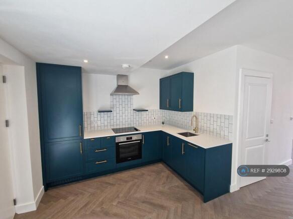 New Kitchen With Dishwasher And Corian Worktop