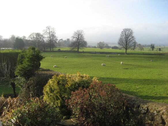 View over open countryside to rear