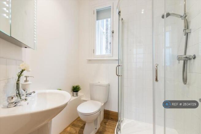 Clean And Modern Bathroom With Walk-In Shower