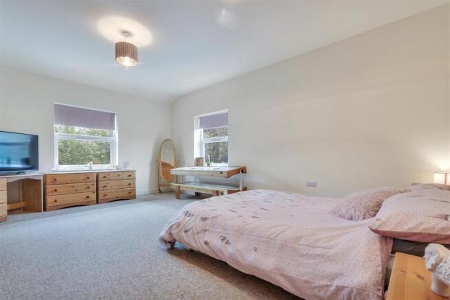 FIRST BEDROOM
