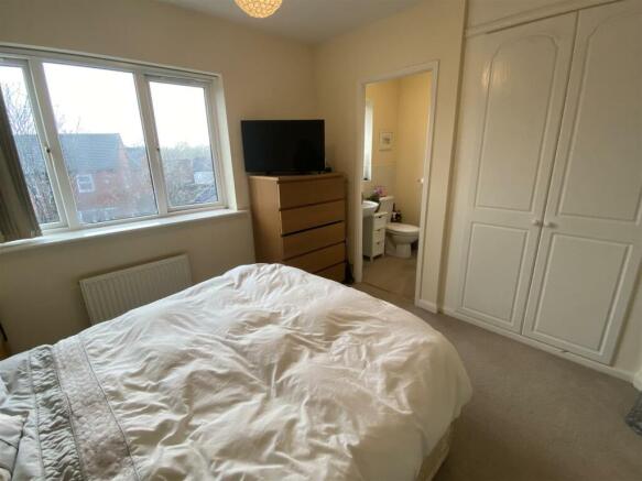 Main bedroom with wardrobes and en-suite