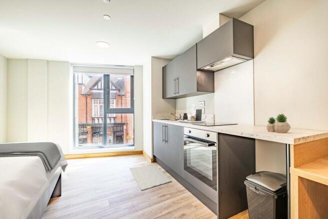 Bedroom, kitchen & living area