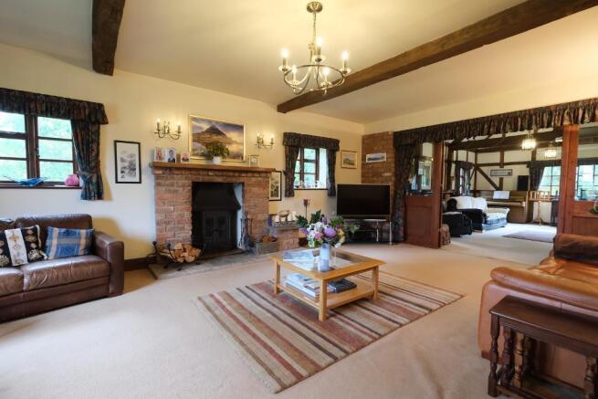 23 ft sitting room with log burner