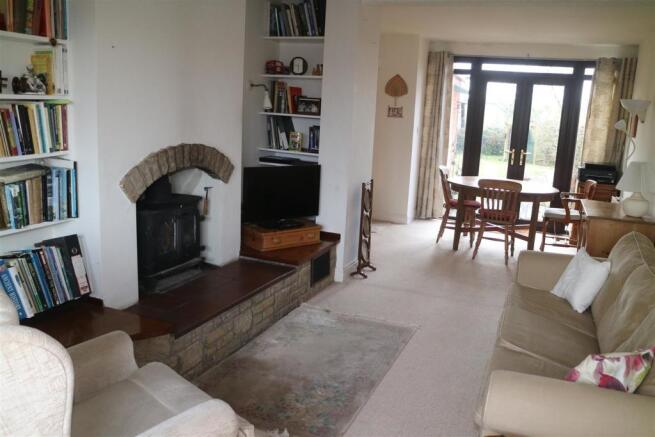 LOUNGE WITH SEPARATE BUT ADJOINING DINING ROOM