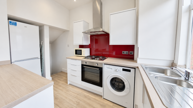 Bright Modern Kitchen with Red Splashback