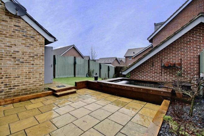 Rear Garden (door to garage)