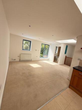 Bright and airy open-plan lounge area...