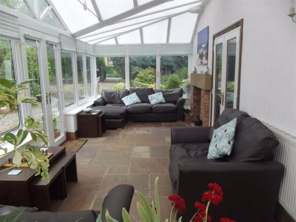 Wrap around conservatory