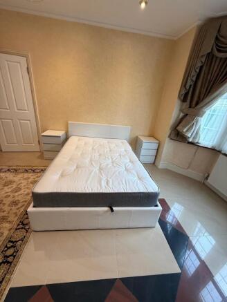 Spacious bright bedroom with double bed...