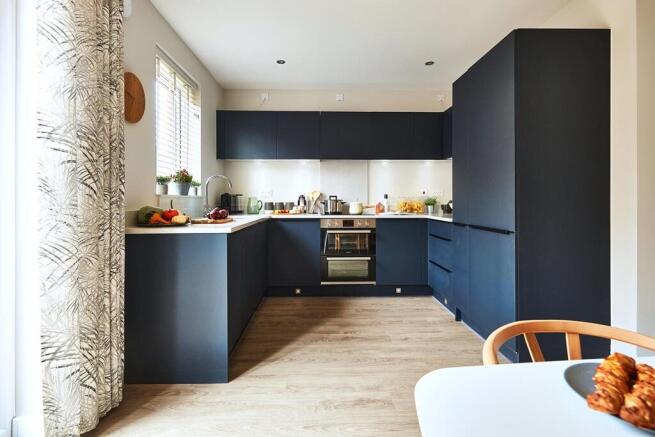 Modern fitted kitchen with ample storage space