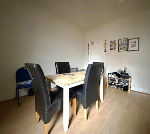 Sociable dining area with modern wooden floorin...