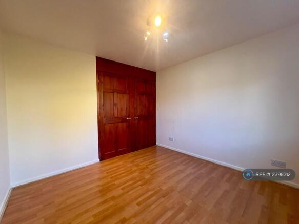 Bedroom (Showing Built-In Wardrobes)