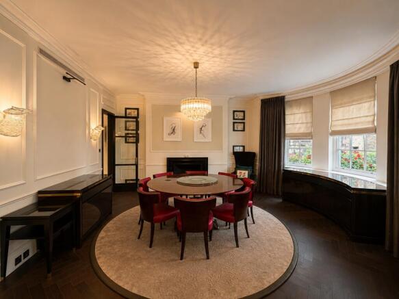 Spacious living room with elegant dining area...
