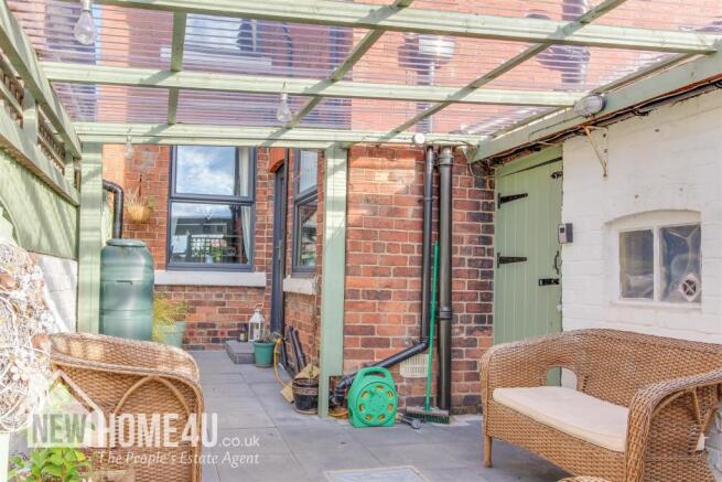 OUTSIDE REAR OF HOME: