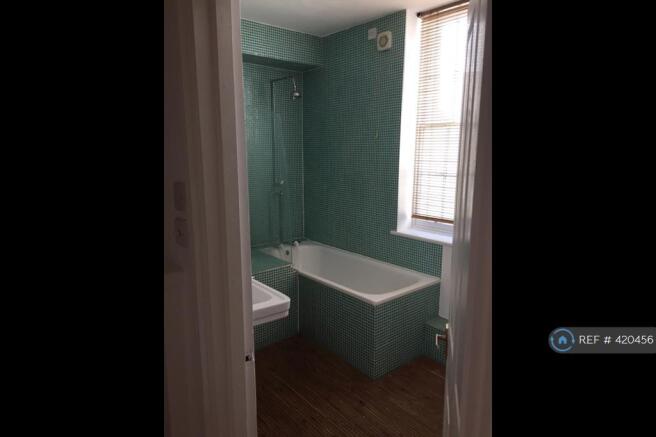 Huge Bathroom With Fired Earth Tiles