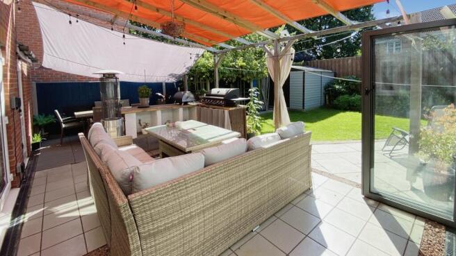 Outdoor kitchen and patio area