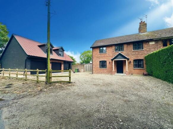 front aspect and driveway