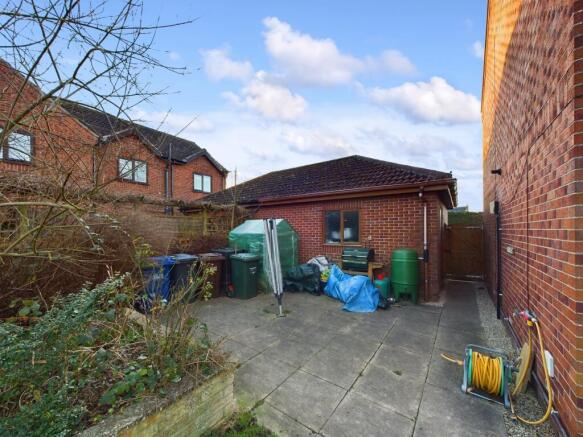 Patio behind 'Double' Garage