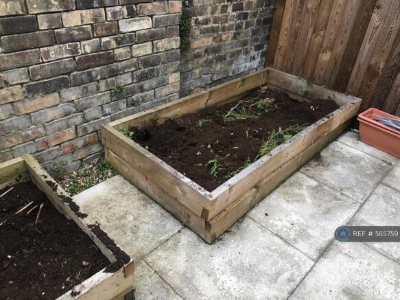 Rear Courtyard With Planters 