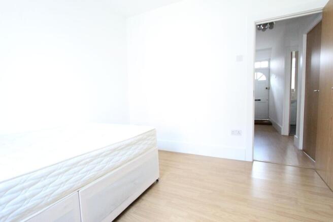 Bright and clean bedroom with modern flooring....