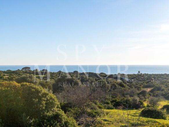 Panoramic ocean views from the frontline Skyblade real estate development land for sale in Ferragudo, Algarve coastal region.