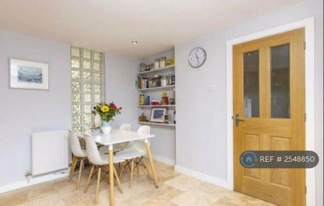 Dining Area- Dining Table And Chairs Provided