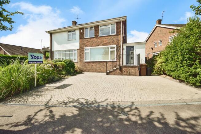 Outside View Of The Property With Driveway Parking