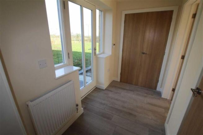 REAR ENTRANCE HALLWA