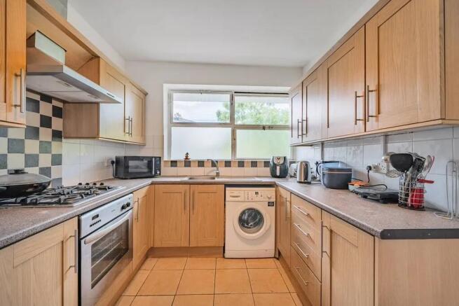 Bright fitted kitchen with appliances...