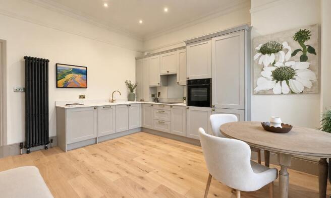 Stylish kitchen and tall ceilings