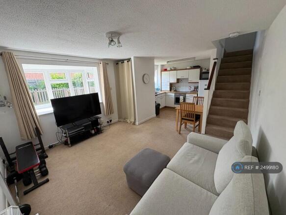Living Room With View Of Kitchen