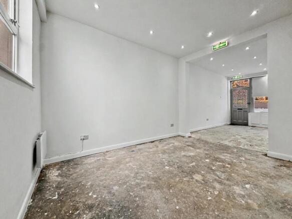 Bright open living space with modern spotlights...