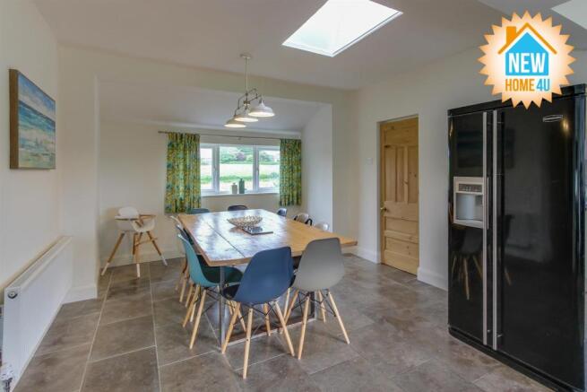 KITCHEN/DINING AREA/ FAMILY ROOM: