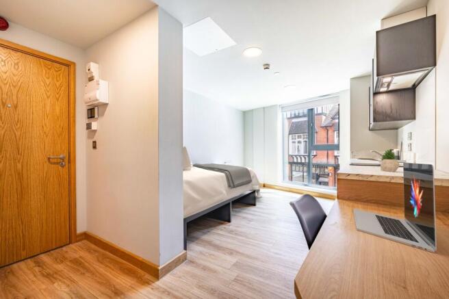 Bedroom, kitchen & living area