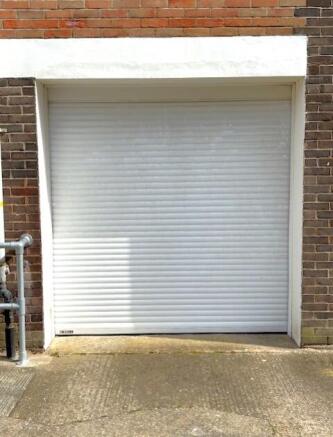 Large secure dry garage with electric up and over 