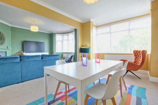 THROUGH LOUNGE AND DINING ROOM